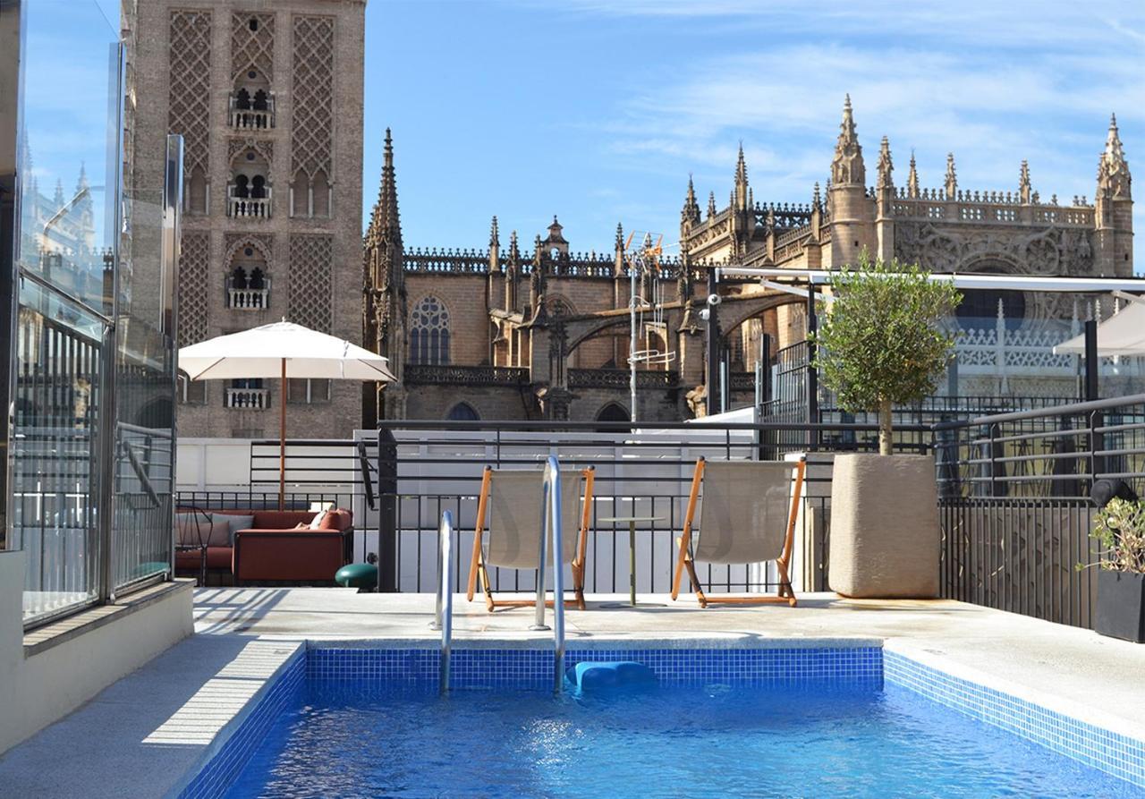 Eme Catedral Mercer Hotel Seville Exterior photo Rooftop pool at Hotel Casa 1887