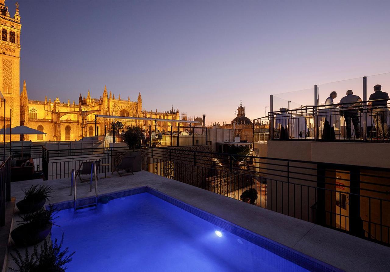 Eme Catedral Mercer Hotel Seville Exterior photo Rooftop pool at Hotel Casa 1800