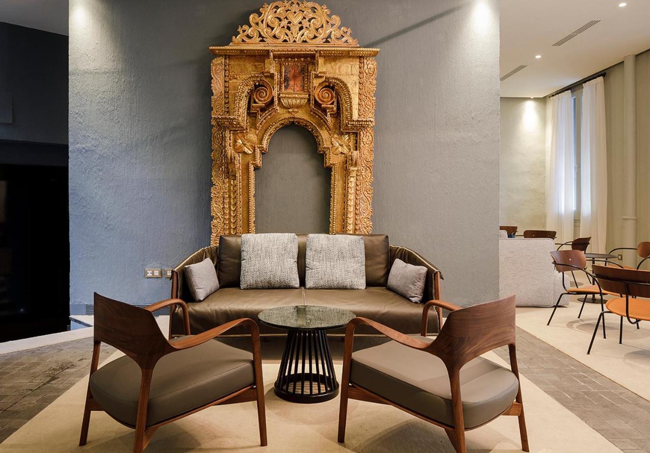 Eme Catedral Mercer Hotel Seville Exterior photo The Library at The Park, New Delhi